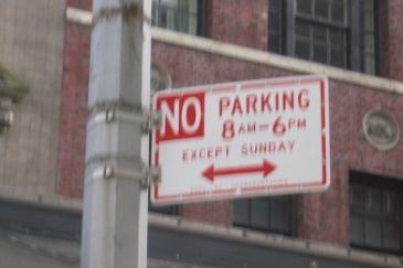 CURB SIGNS 1 2 3 NO PARKING 11AM TO 12.