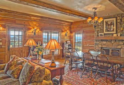 OWNER S HOME This beautiful two-story house has the look of a log home but is stick-built with
