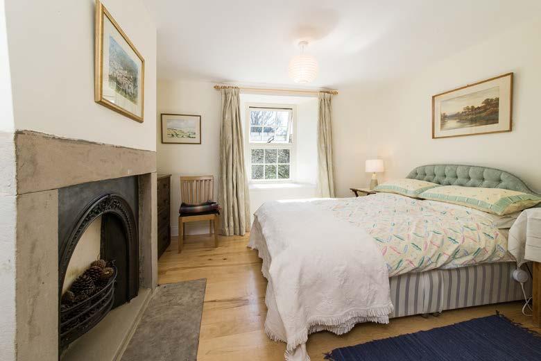 To one end there is a dual aspect master bedroom with a range of fitted wardrobes, together with a further double bedroom, bathroom and separate WC.