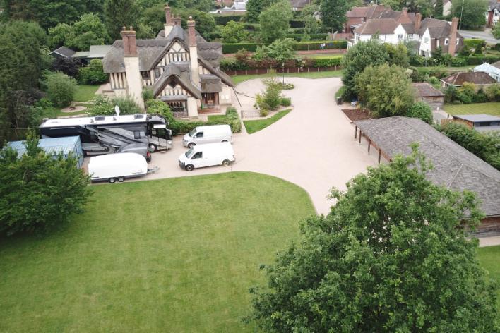 oak to create this impressive detached residence approached via a double gated entrance and set within