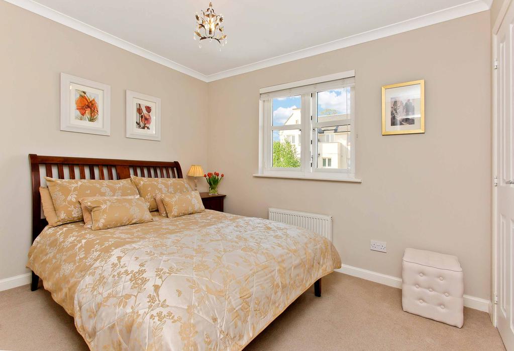 Both bedrooms are attractively-presented and accentuated by classical coving and