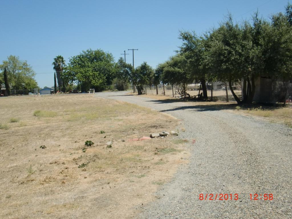 1. Photo of the existing access driveway on the proposed project site from 26 th Street.