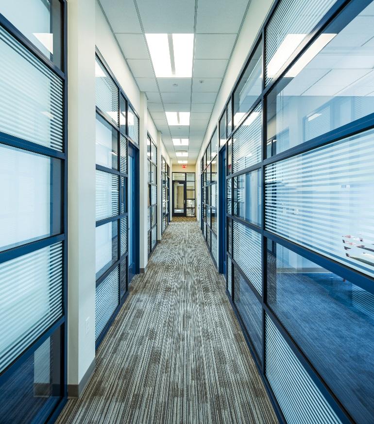 T01.0 Top: Views of office corridor.
