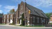 1 Albert Street 484 Princess Street United Church Red brick church with stone foundation, built in 1931, in the