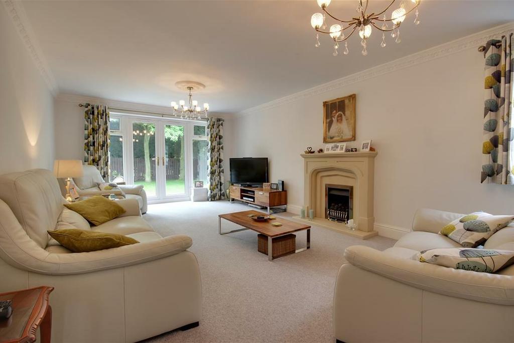 There are a series of three reception rooms situated off the beautiful hallway and the heart of the house is a fabulous living kitchen with contemporary units and island.