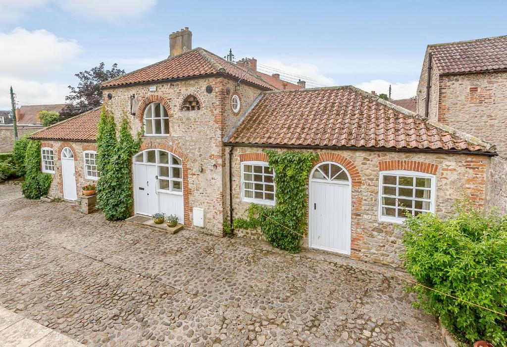 The Stable Cottage In addition, there is a charming 2-bedroom cottage built of brick and flint under a pantile roof which is full of character.