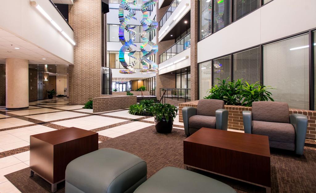 Atrium Lobby with Stunning Contemporary Art Sculpture and Spacious Guest Seating Areas On-Site Security and Live