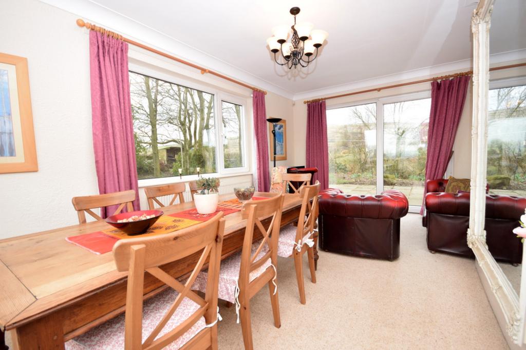 There are three reception rooms including a large open-plan lounge and dining room, a spacious office and dining kitchen with Aga on the ground floor.