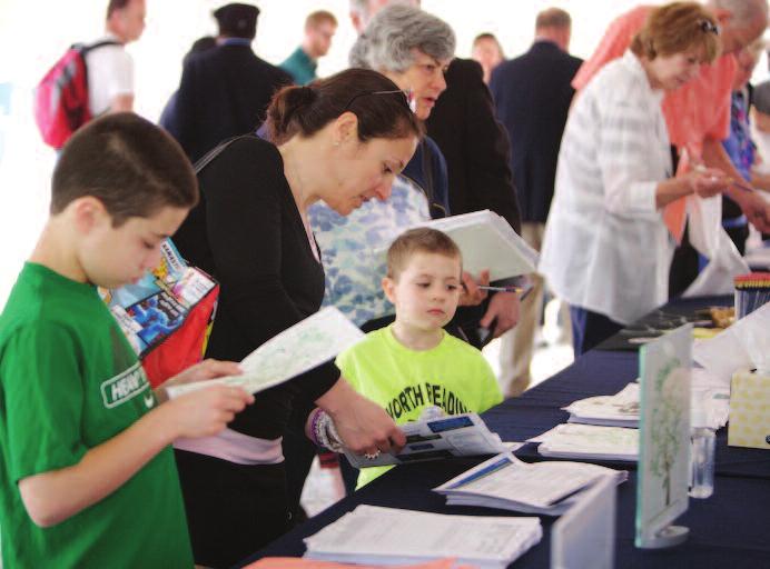 Visitors explore the National Archives annual Genealogy Fair in Washington, DC.