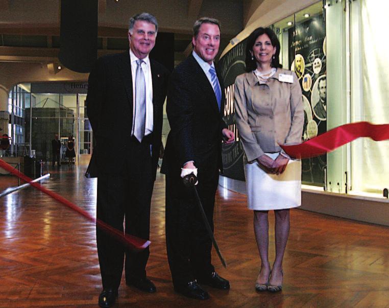 Archivist of the United States David S. Ferriero joins Bill Ford and Patricia Mooradian as Ford cuts the ribbon to open Discovering the Civil War at the Henry Ford Museum in Michigan.