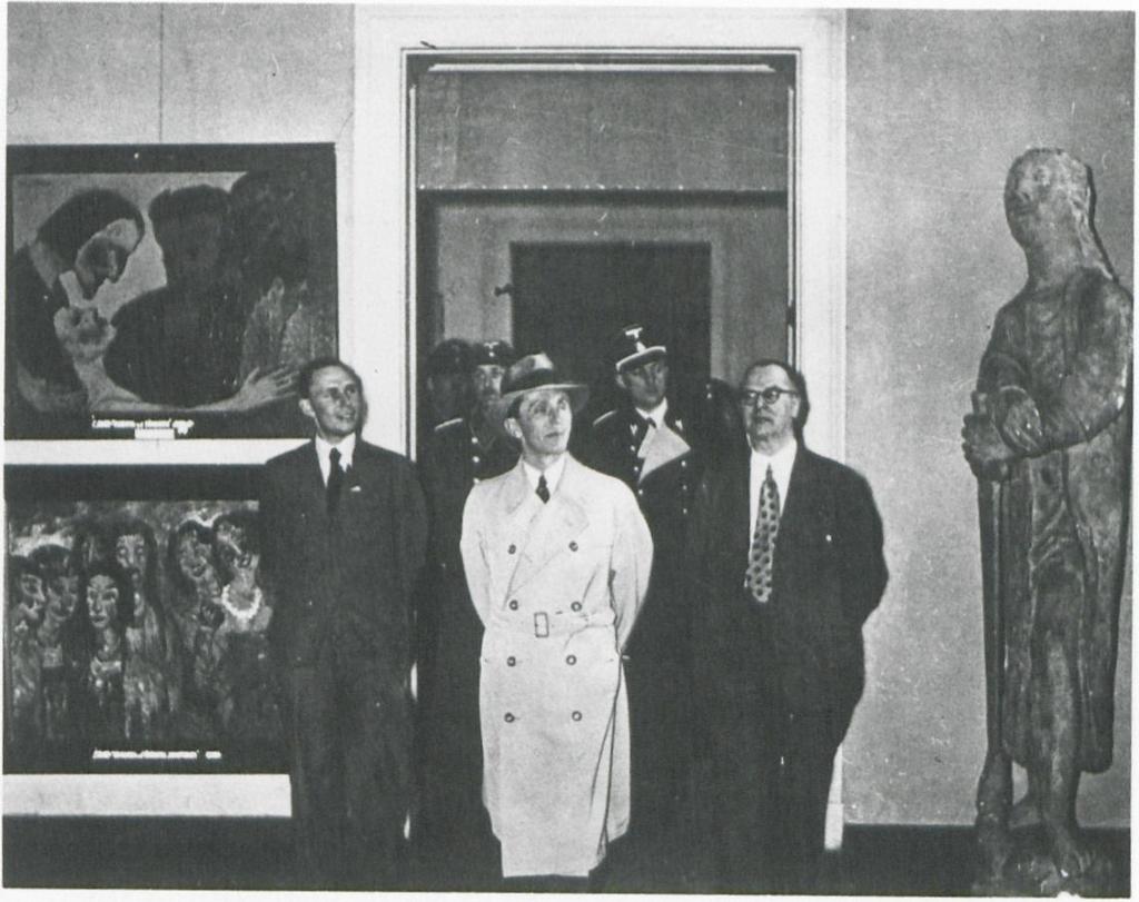 Figure 70 Joseph Goebbels (center) visits Entartete Kunst in Berlin
