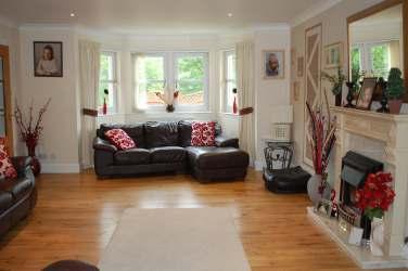 Accommodation: The property is entered by its front door leading into the hallway, which has quality wooden flooring, and excellent storage by way of two built in cupboards, one of which with coat