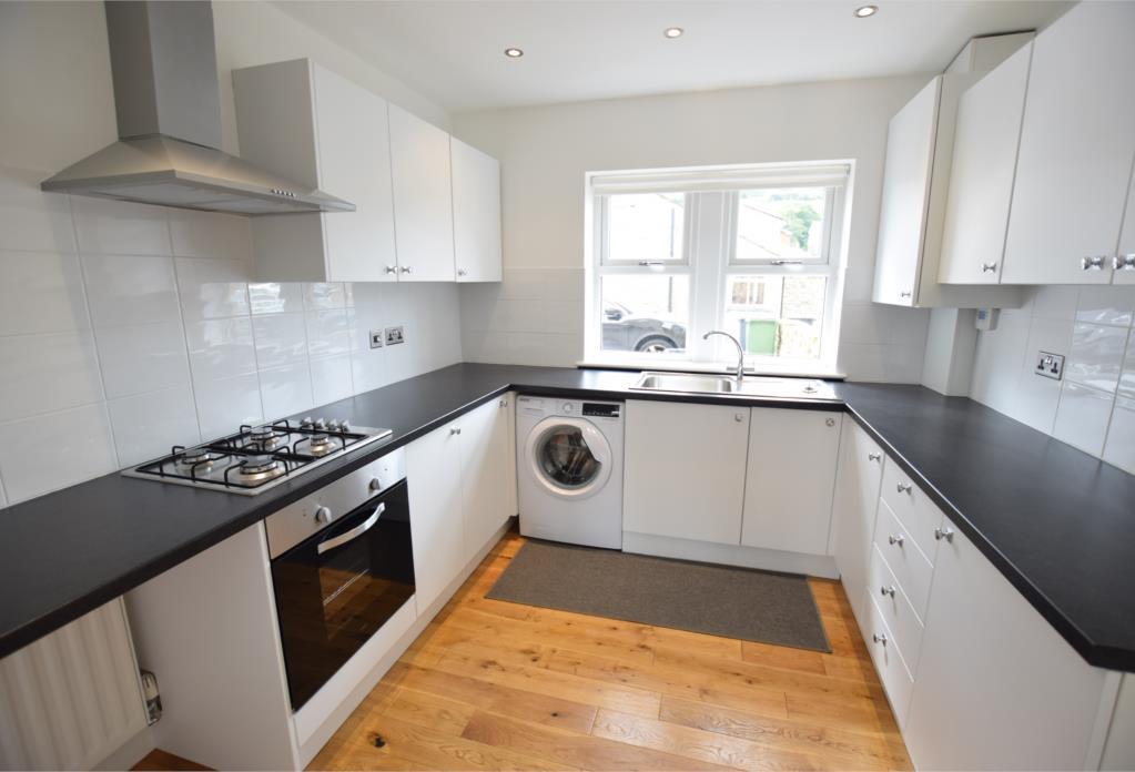 provide a pleasant outlook up towards Castle Hill, it houses the central heating Worcester Bosch boiler and also includes an A rated Hoover washing machine FIRST FLOOR LANDING Taking the staircase to