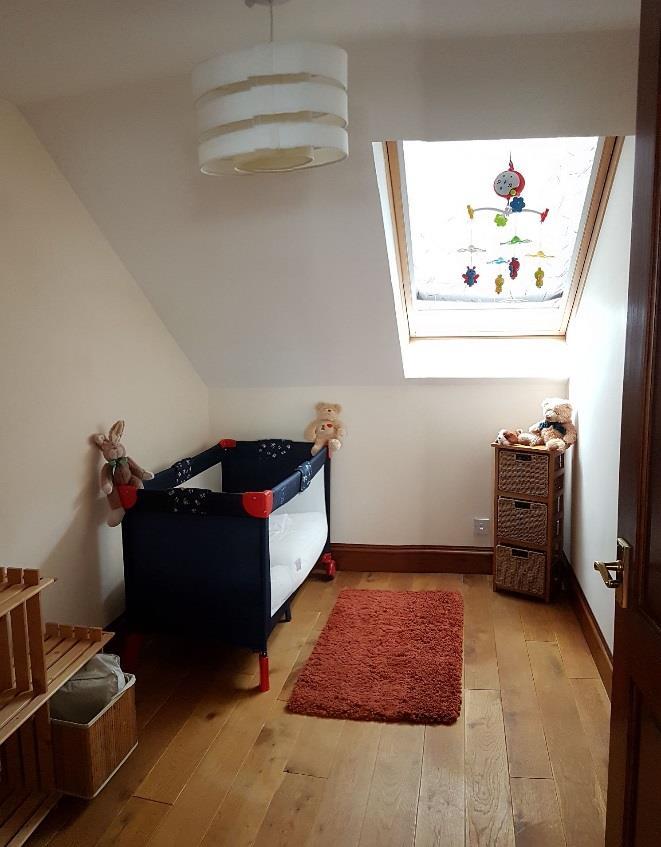 spacious double bedroom decorated and carpeted in neutral tones. T.V. and Telephone points.
