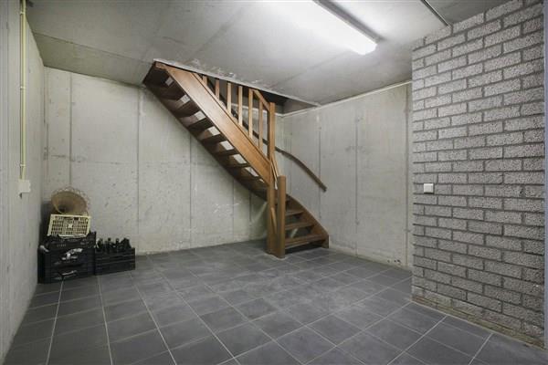 In addition a staircase provides access to the indoor apartment on the first floor. Basement: From the foyer a solid wooden staircase provides access to the spacious basement.