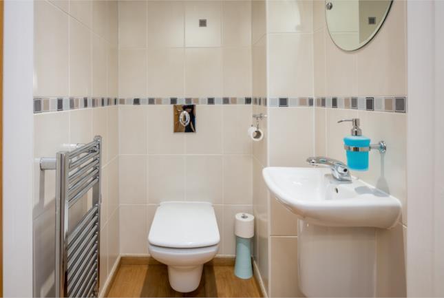 bath and into the living room DOWNSTAIRS WC 4' x 3' 8'' (122m x 091m 244m) The downstairs wc features a white two piece suite comprising of a low level wc with concealed cistern and push button