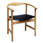 in cognac  Armchair with frame in soaped oak
