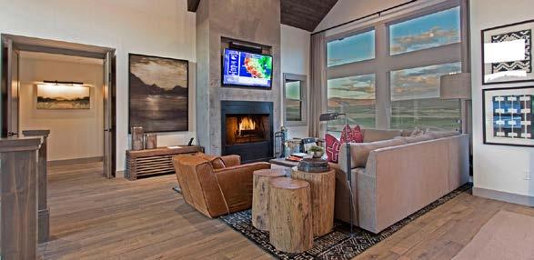 The living room, dining room and gourmet kitchen flow together and outside onto a large deck offering spectacular views of the Golf Course and surrounding mountains.