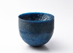 I try my best to produce the barest structure possible in taking part in this creation of transient forms. Structural Blue is made of glass powder and copper oxide fired in a mold.