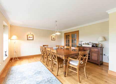 In addition, the property is positioned on an extensive elevated site laid out with formal lawns and patio area enjoying a stunning position with breath-taking sea views towards Rathlin, the Scottish