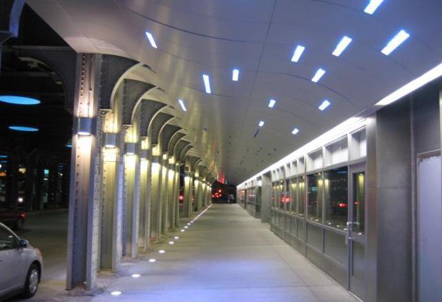location with lighting over street and sidewalk, upgrades to LIRR infrastructure.