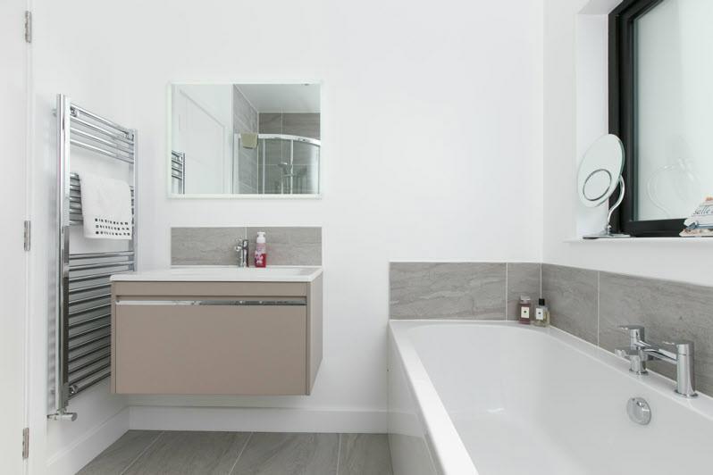 77m) BATHROOM: Contemporary 4-piece suite comprising panelled bath with