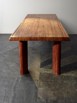 CHARLOTTE PERRIAND (1901-1984) Charlotte Perriand (1903-1999), Dining Table, 1958 Dining table made of massive rosewood rectangular top featuring groove on