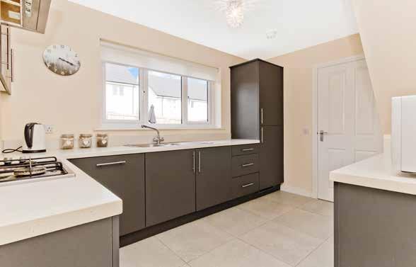 interiors, a generous secure garden, a private driveway and