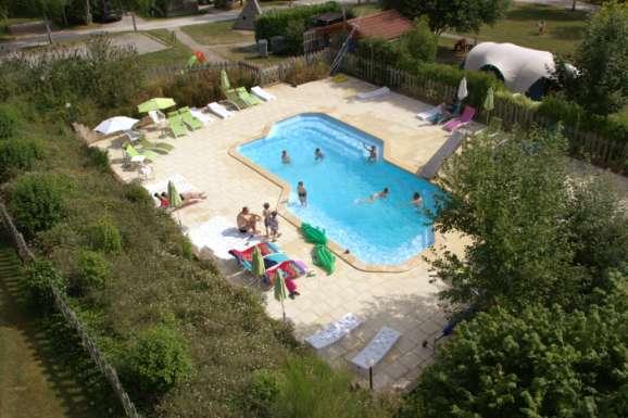 There are also pitches located at the higher part of the land. These are accessible by a rear entry. The pool: It s a polyester cock (approx. 8 x 12m).