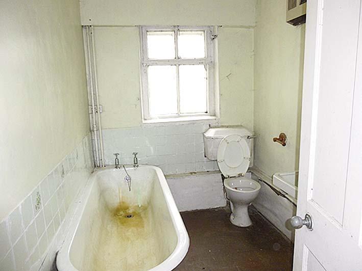 BATHROOM 8 9 X 5 11 Bathroom suite consisting of bath, wash hand basin and WC. Bathroom cabinet. Dimplex fan radiator.