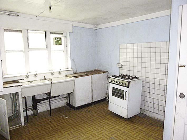 Gas cooker (no guarantees are given to its working condition). Central heating radiator.