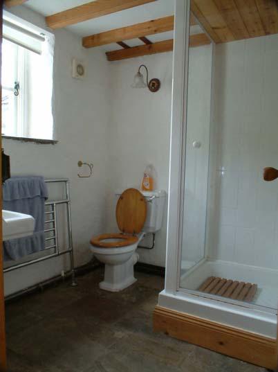 Washbasin. Heated towel rail. Wall light. Extractor. Heated flagged floor. Rear Hall 1 Pantry 2.01m x 1.