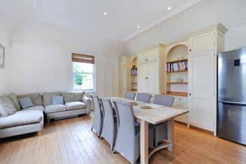 There is a superb kitchen/breakfast room with doors out on to the decked terrace, and an L-shaped sitting room featuring two carved stone fireplaces, parquet flooring and enjoying a dual aspect which