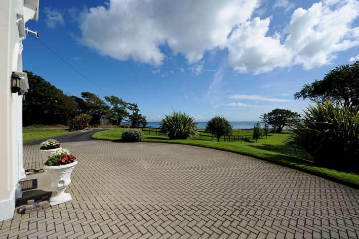 This Period detached 2,600 Sq Ft family home is positioned on an elevated site of approximately two and a half acres with stunning panoramic views over the Irish Sea to Scotland.