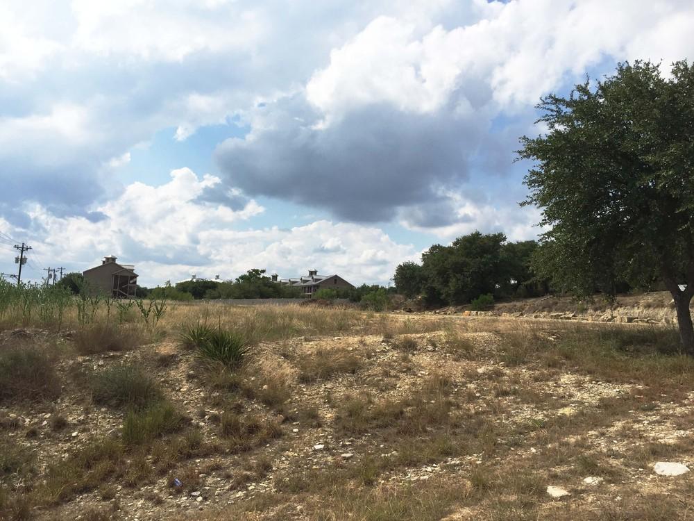 Executive Summary OFFERING SUMMARY Sale Price: $299,500 PROPERTY OVERVIEW 1.003 Acre Corner Lot on FM 306 and Grand Pass at Beautiful Canyon Lake surrounded by new development.