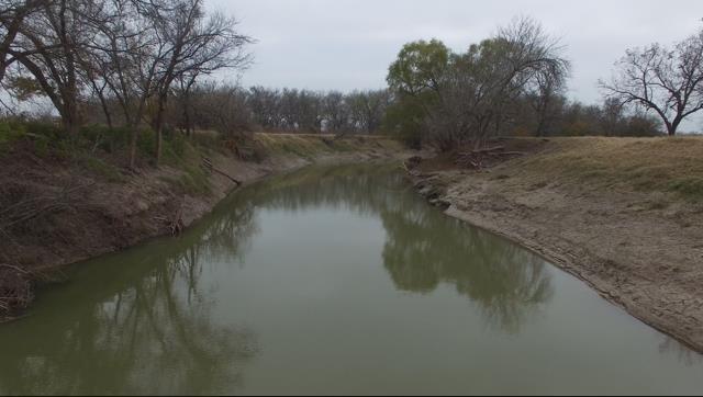 Rare find in Coryell County with over 2,400 feet of Leon River frontage in Mother Neff Park