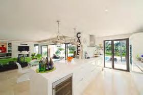 Entrance level; double height ceiling entrance hall, open-plan kitchen lounge and dining