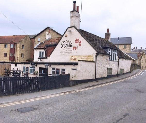 DESCRIPTION The property comprises a two storey brick built public house that sits under a pitched tiled roof. Flat roof single storey extensions are located to the side and rear.