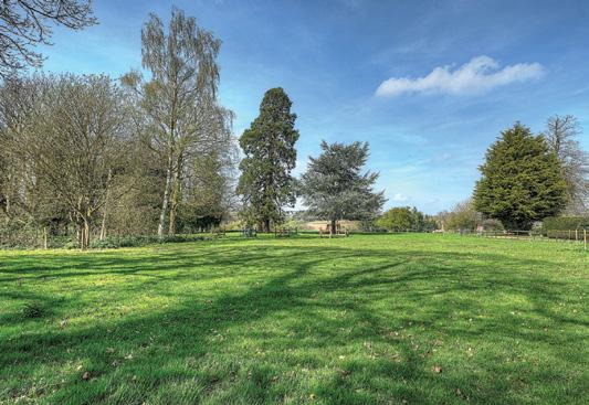 garden which has now been put to lawn, with greenhouse, some stables and a beautiful barn. The property would suit the equestrian enthusiast, with stabling and fields.