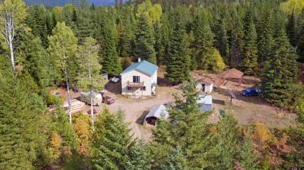 $169,900 MLS #21810817 105 Driftwood Point Lane, Trout Creek, 59874 Contact: Sharon Sorlie at (406) 546-5030 or rnwsharon@gmail.com Remarks: HUNTERS RETREAT!! New Updates!