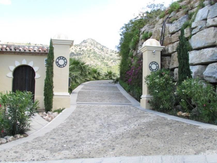 Moorish fort (that inspired the design of the house) in the mountain backdrop, this property will offer the discerning owner the utmost privacy within a gated, 24 hour, secured