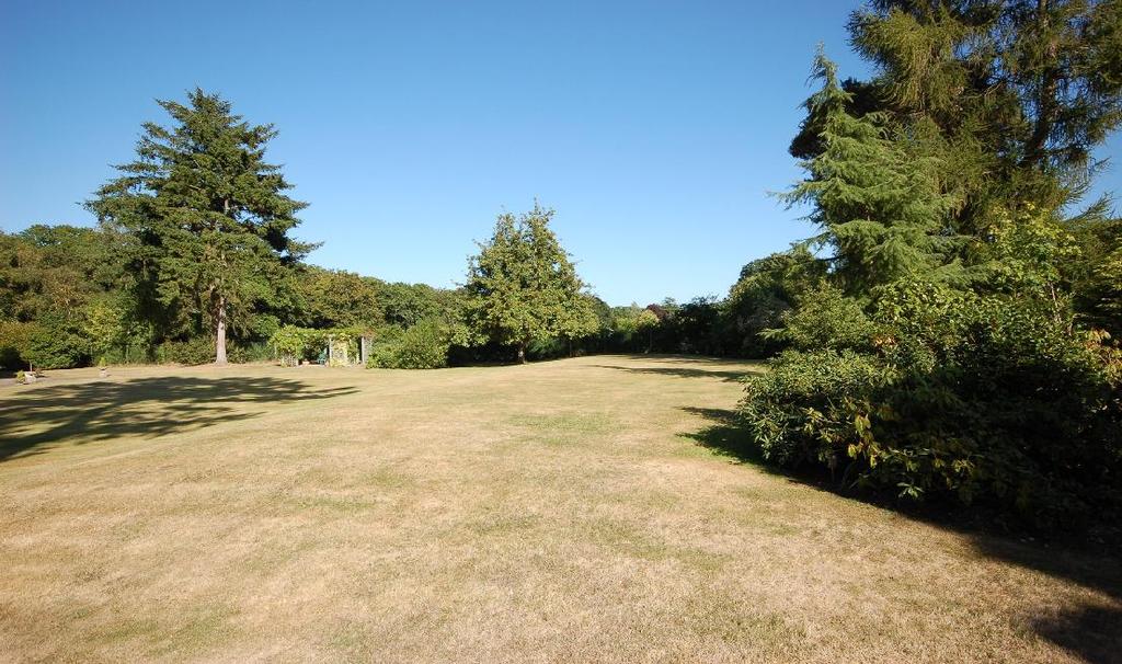 GARDEN AND GROUNDS The property is well set in a mature plot extending to approximately 1.