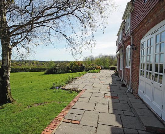The property enjoys a superb South-facing aspect within mature gardens and grounds of approaching 2.