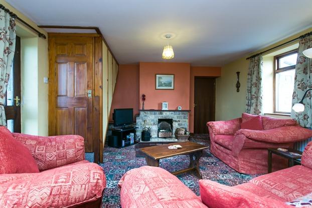 fireplace with an inset wood burning stove, rear pantry. To the first floor are 4 good sized bedrooms and a family bathroom, comprising of a bath, wash-hand basin and w.c. Further stairs lead to a large open attic which would be suitable for further accommodation.
