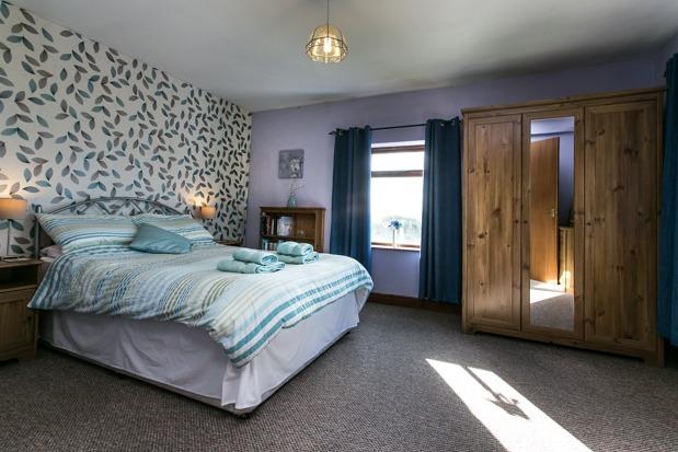 The property is subject to an Agricultural Occupancy Condition, but is now currently run as a successful holiday cottage (www.caldertopcottage.co.uk).