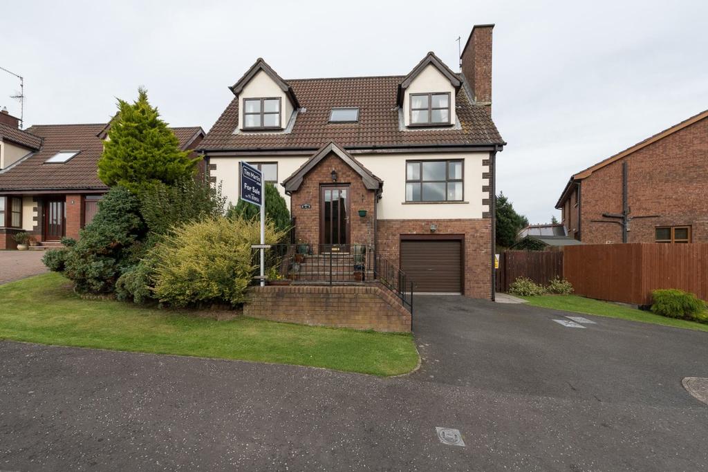 The property boasts integral garage, oil fired central heating and double glazing, whilst externally the fully enclosed gardens have been landscaped with areas laid out in lawns and flowerbeds