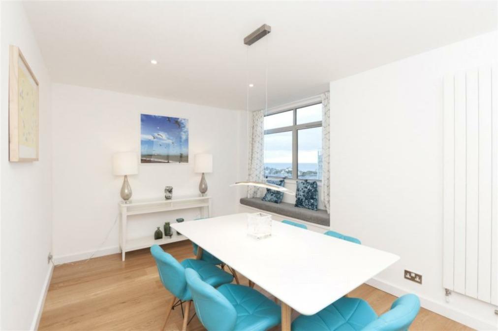 why you ll like it... High above the heart of this vibrant coastal city this spacious apartment spans the top storey of a striking modern building with a secure entrance.