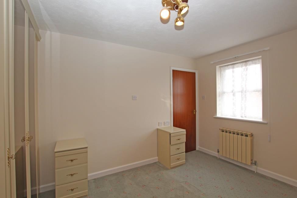 Bedroom 2 12 8 x 11 9 Fitted with a range of bedroom furniture comprising wardrobes, dressing
