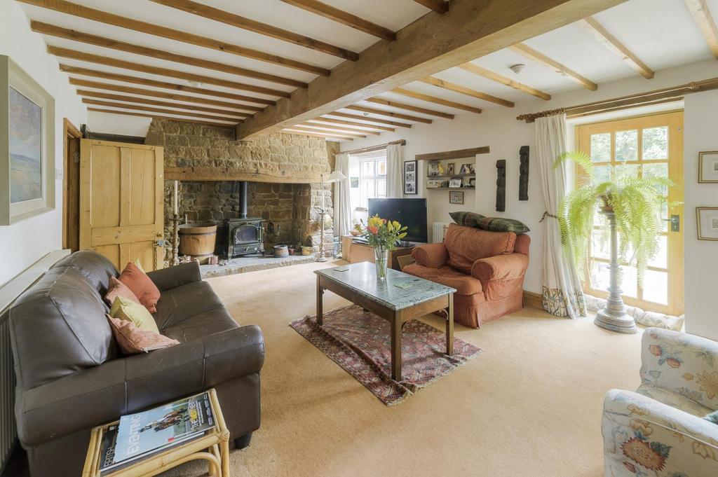 Main House Ground Floor Superb drawing room with exposed beams, window seats and inglenook with oak bressumer and exposed stone work.