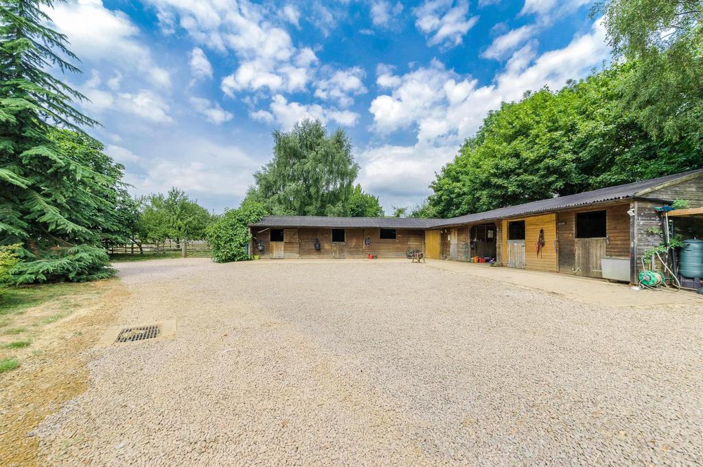 Outbuildings The L shaped timber stable block stands in close proximity to the